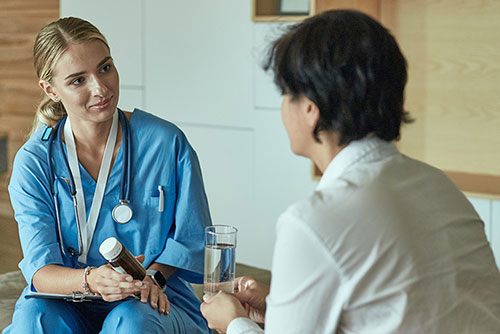 Nurse consulting patient