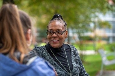 African American woman talking to another woman