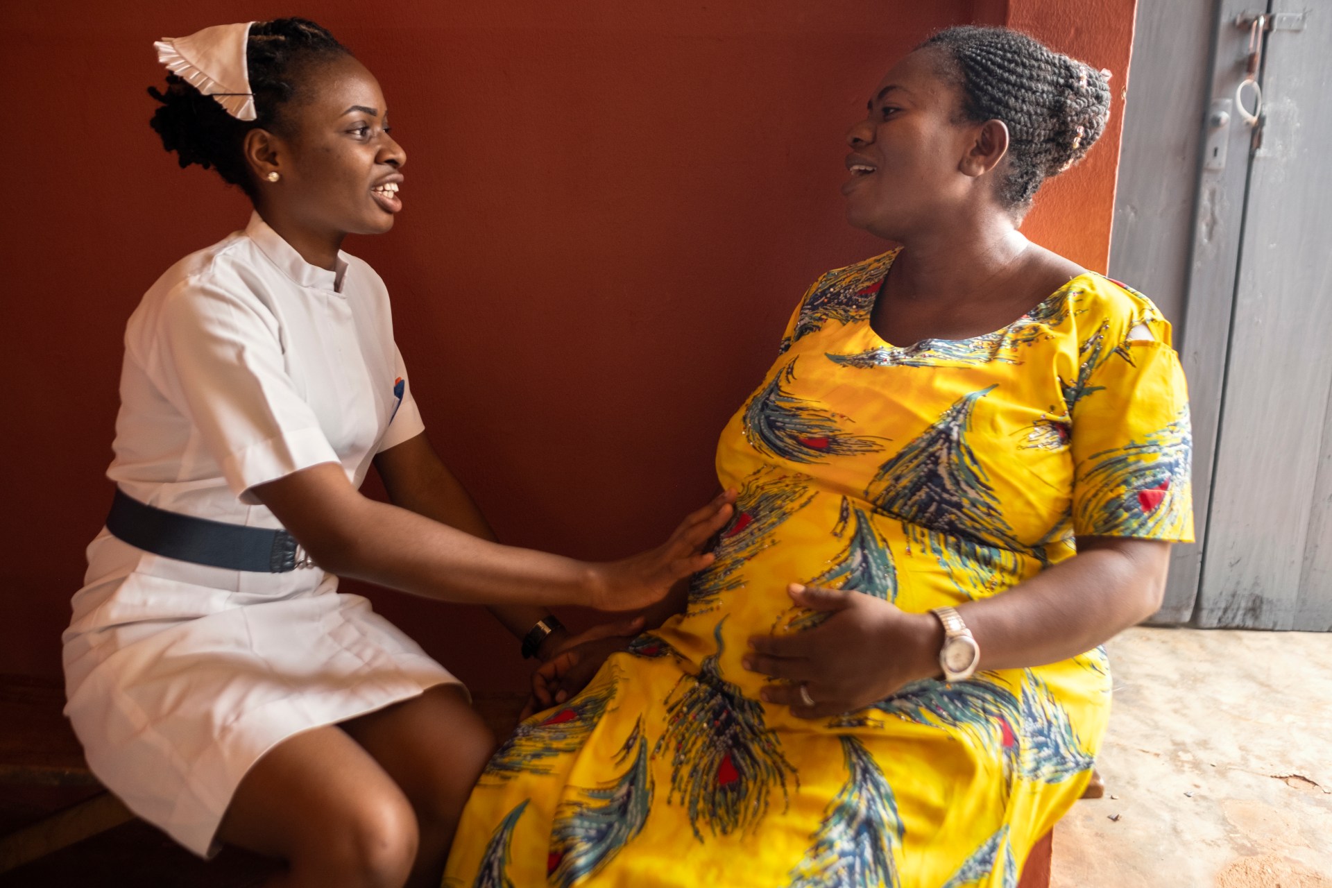 Nurse consulting patient in Nigeria