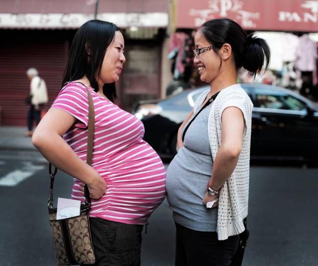 two pregnant women