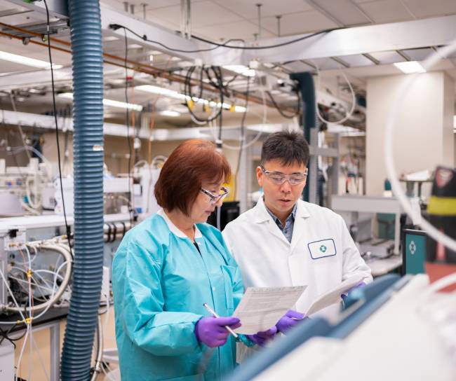Man and women scientists in a lab