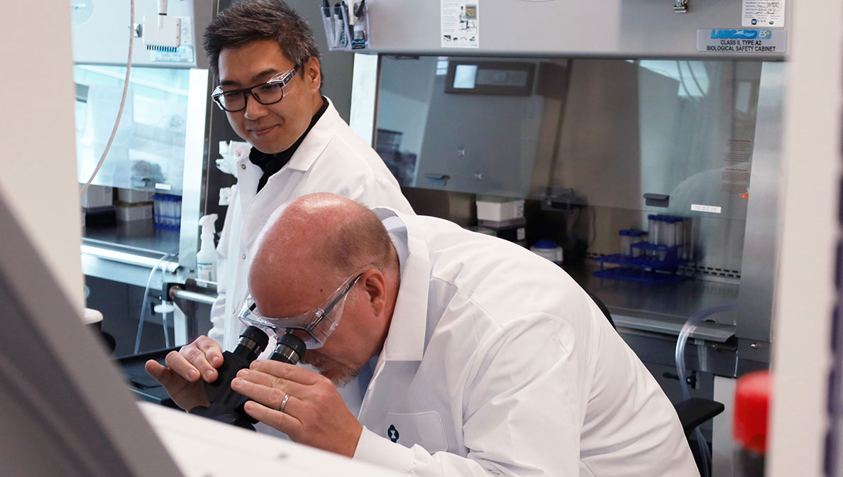 two scientists working in the lab