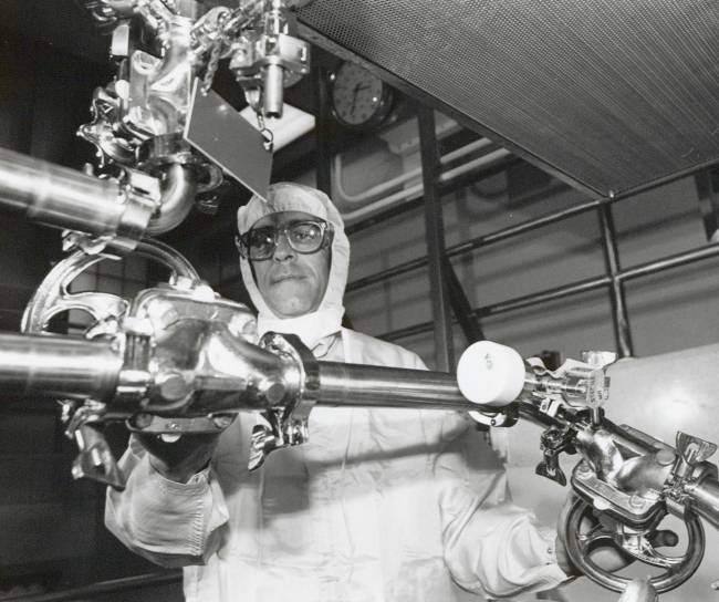 scientist working with equipment
