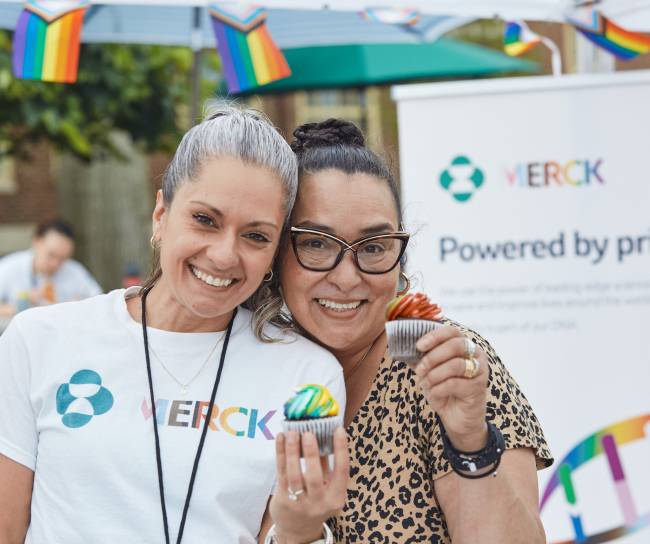 two women smiling at EBRG event