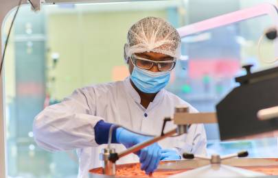 scientist wearing protective gear in lab