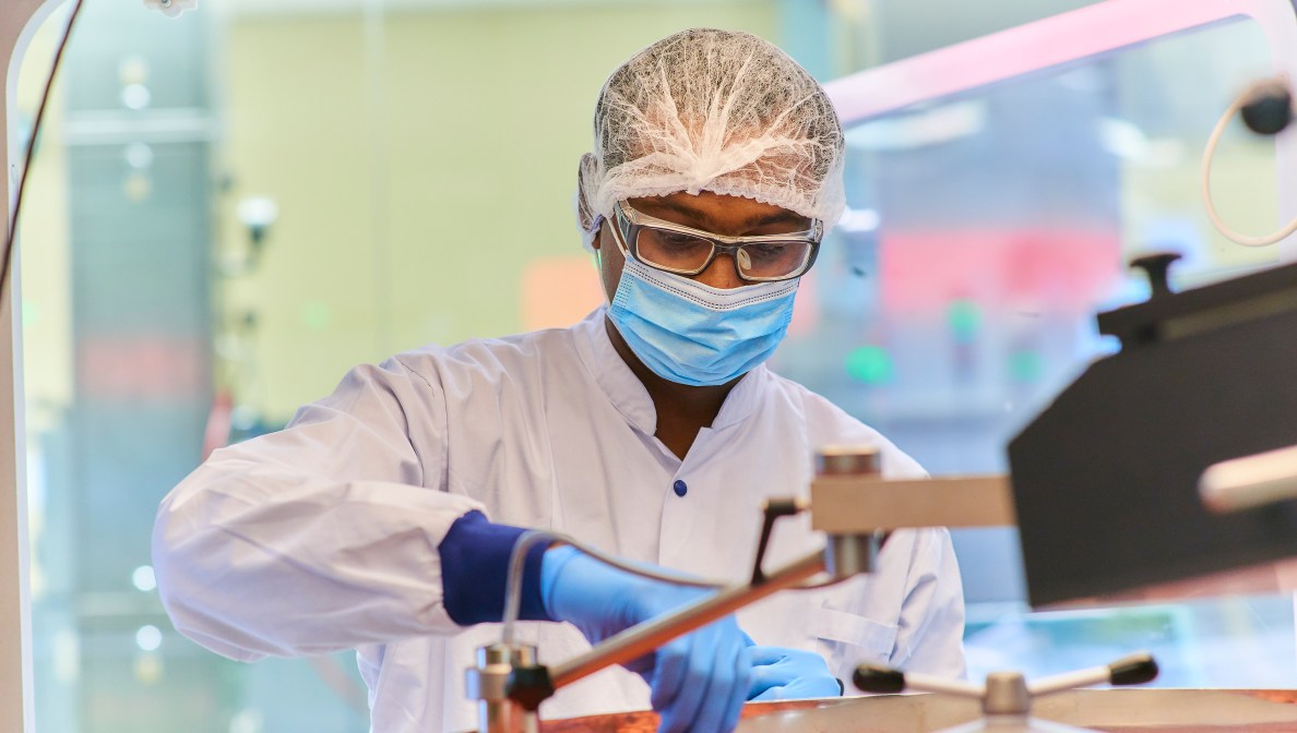 scientist wearing protective gear in lab