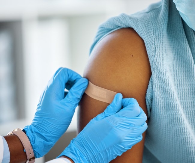 Band aid applied to arm