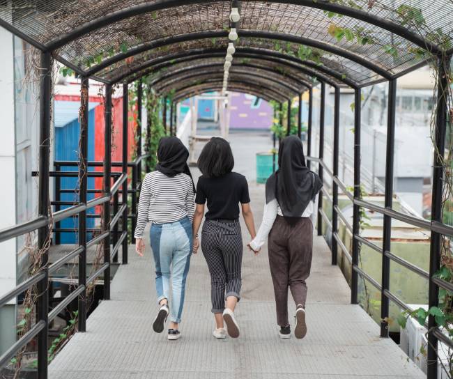 three women walking