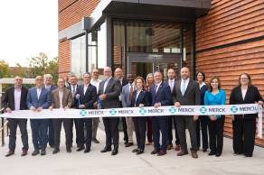 Large group of Merck leadership at West Point, PA, ADVANCE facility ribbon cutting