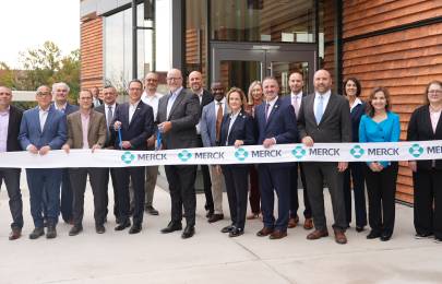 large group of Merck leaders at West Point, PA, ADVANCE facility ribbon cutting